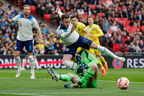 James Maddison goes in on Anatolii Trubin, after the Ukraine goalkeeper spills the ball.