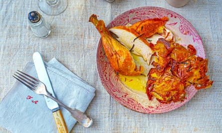 Recipe for punched potatoes and a roast chicken by Olia Hercules. Food and prop styling: Polly Webb-Wilson.