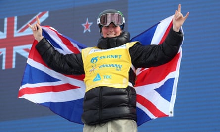 Mia Brookes celebrates on the podium.