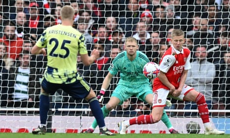 Leeds United's Rasmus Kristensen (left) scores their first goal from a deflected shot off Arsenal's Oleksandr Zinchenko (right).