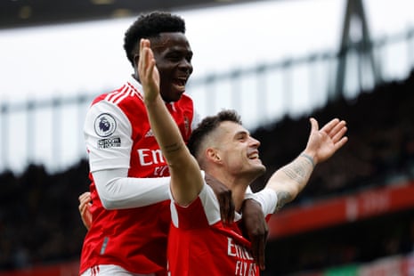 Arsenal's Granit Xhaka celebrates scoring their fourth goal with Bukayo Saka.